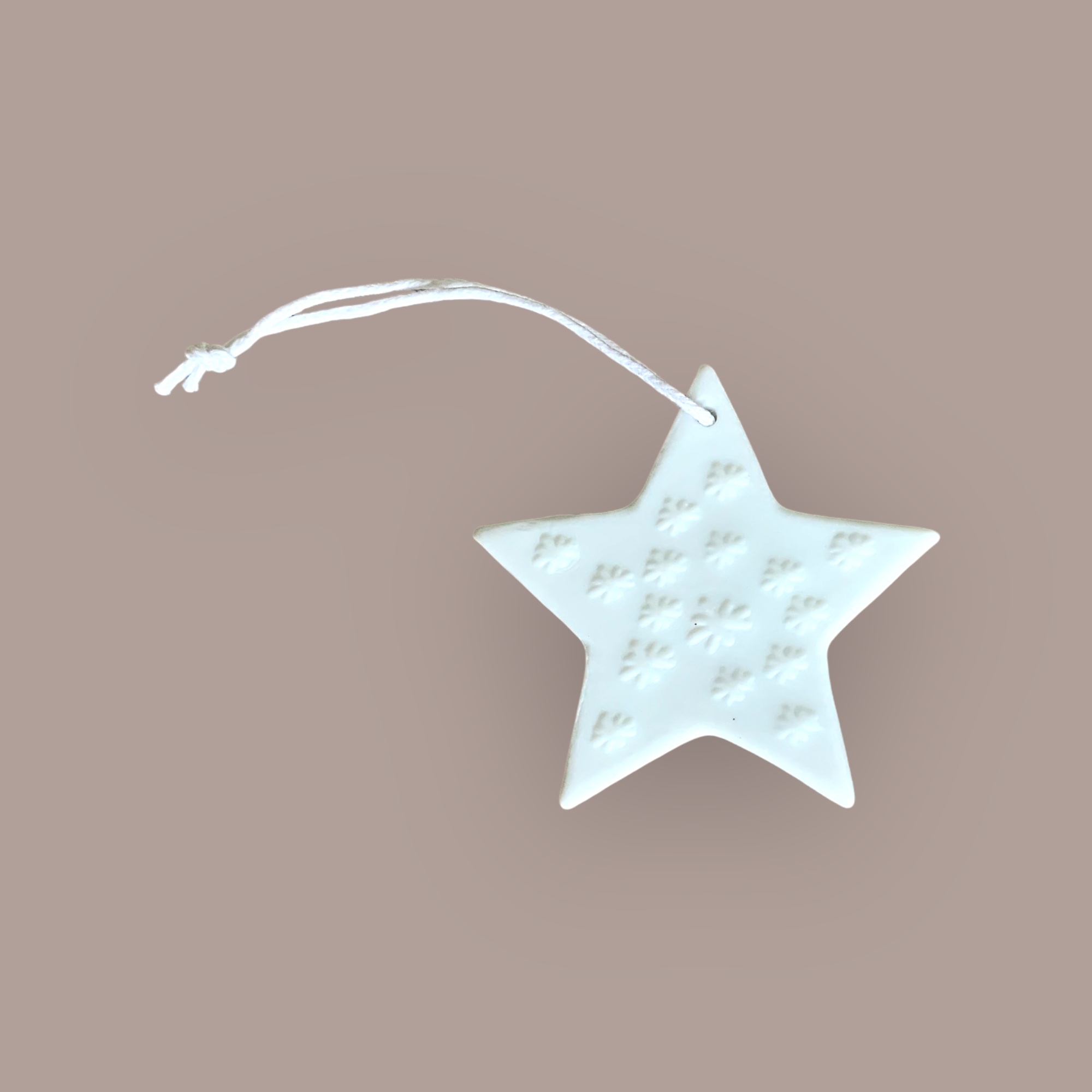 Etoile à suspendre en céramique